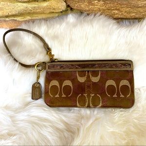Coach Wristlet with Bronze Accent embellishments